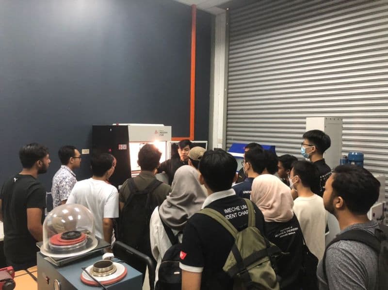 Students and engineers exploring 3D printing innovation at University of Malaya with 3D Gens